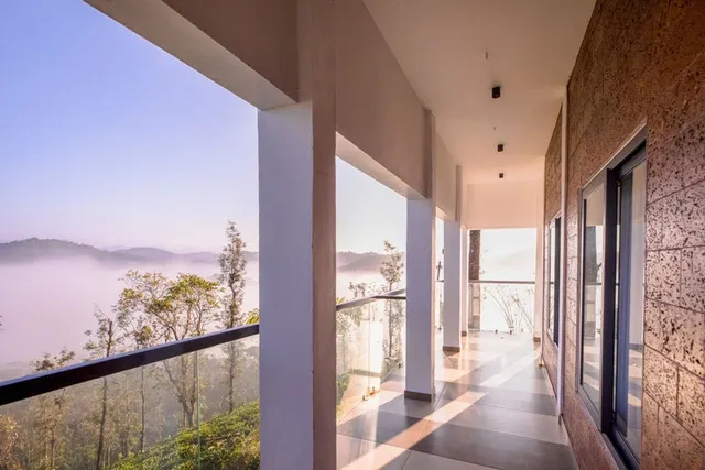 A private balcony overlooking Wayanad's forest canopy